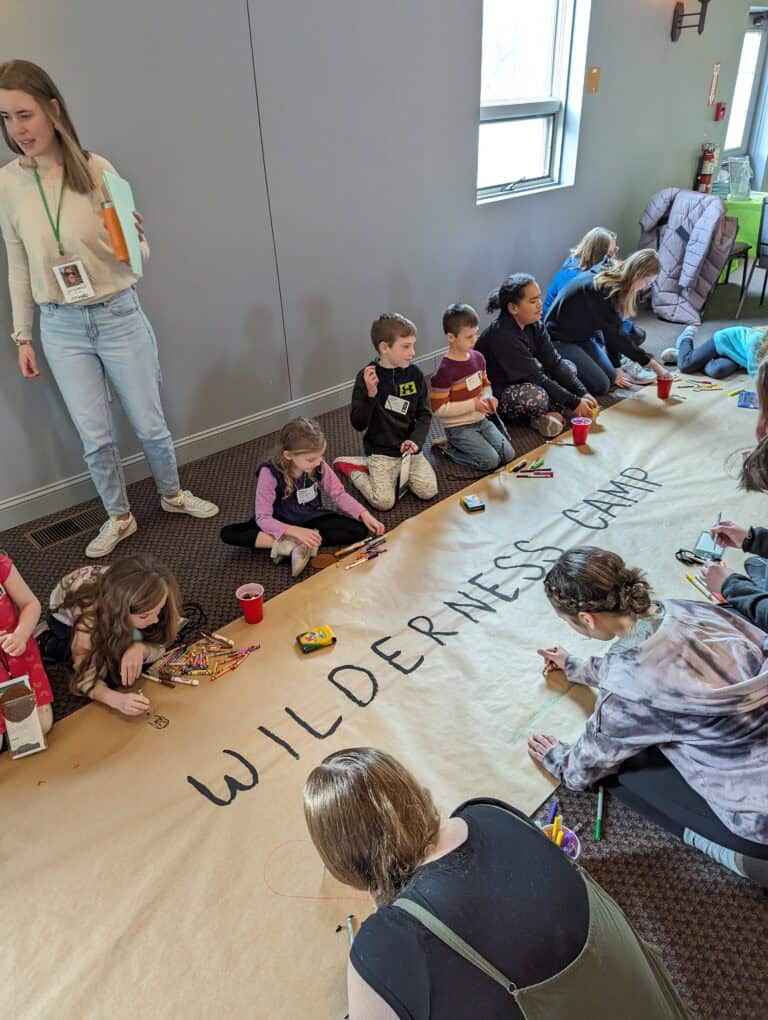 Kids drawing on big paper