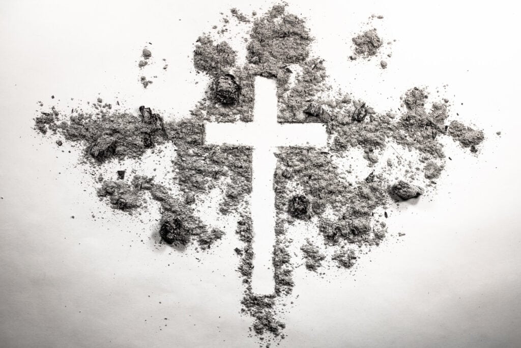 Ash wednesday cross, crucifix made of ash, dust